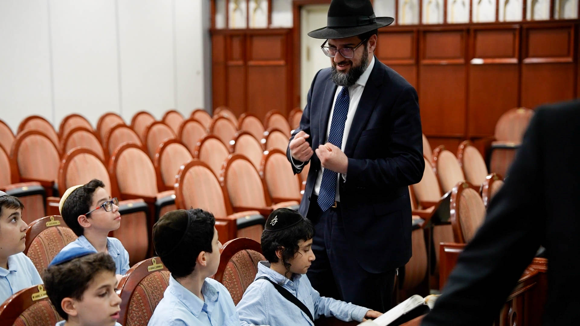 Rabbi Azoulay learning with students